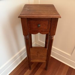 Wooden side table with drawer