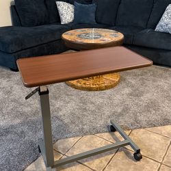 Brand new adjustable over bed table by VAUNN MEDICAL
