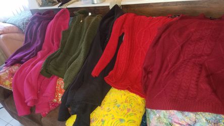 pile of sweaters , Son with Beanies really nice condition
