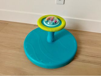 B. toys Spinning Activity Toy Twirly Time
