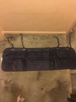 BRAND NEW NEVER USE STORAGES CARRIER FOR BACK OF SUV SEATS $10.00