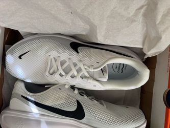 Nike White Low-Top Sneakers with Black Swoosh