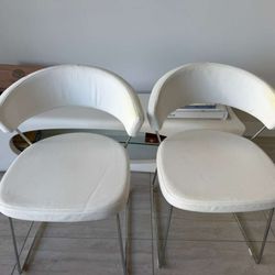 2 Italian leather chairs