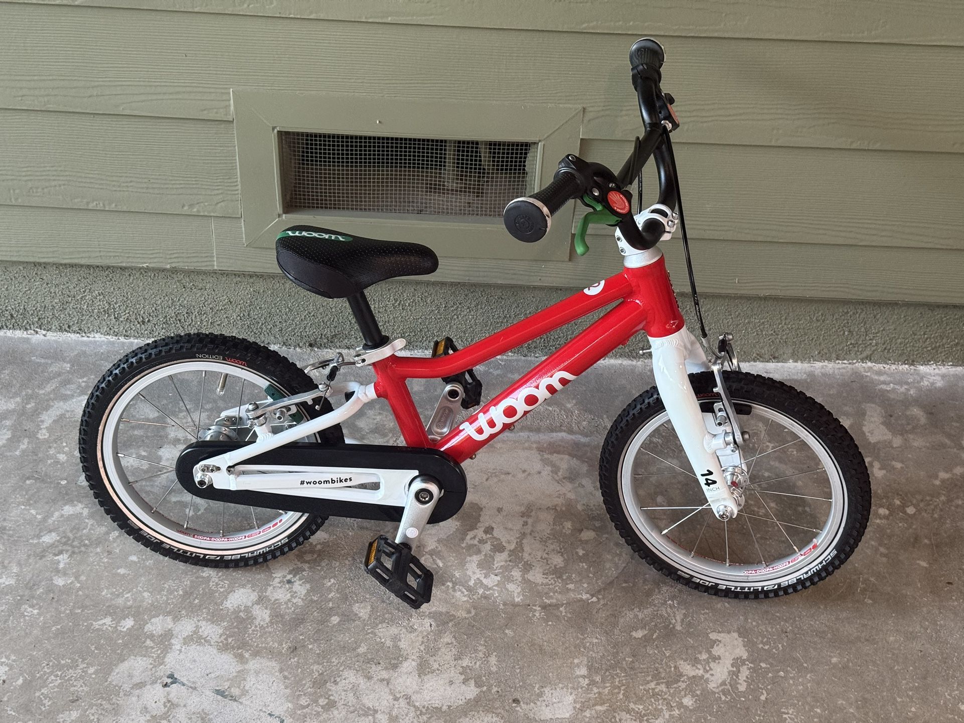 Woom 2 kids 14 inch light weight bicycle in great shape