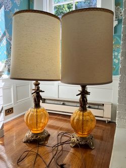 Pair of mid century cherub lamps