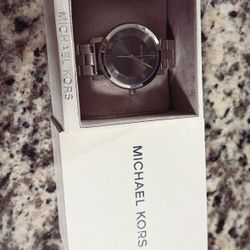 Woman’s Michael Kors Stainless Steel Rose Gold Watch