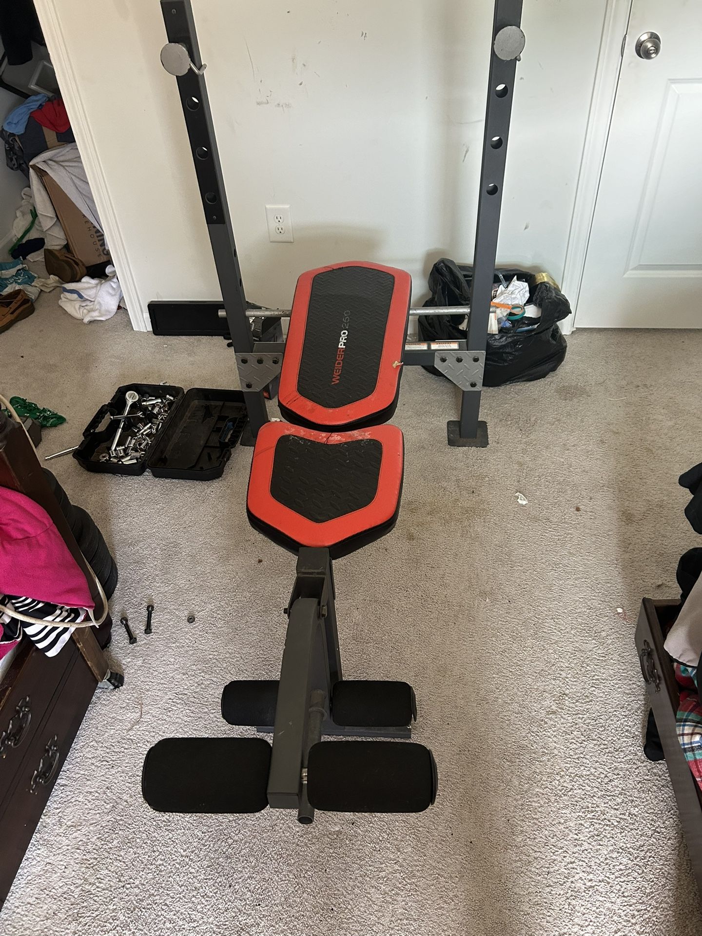 Weight Bench, Barbell, And Plates
