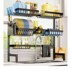 drying shelf of dishes over the sink,