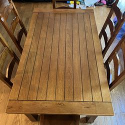 Extendable Dining Table Hard Wood with Eight Chairs 