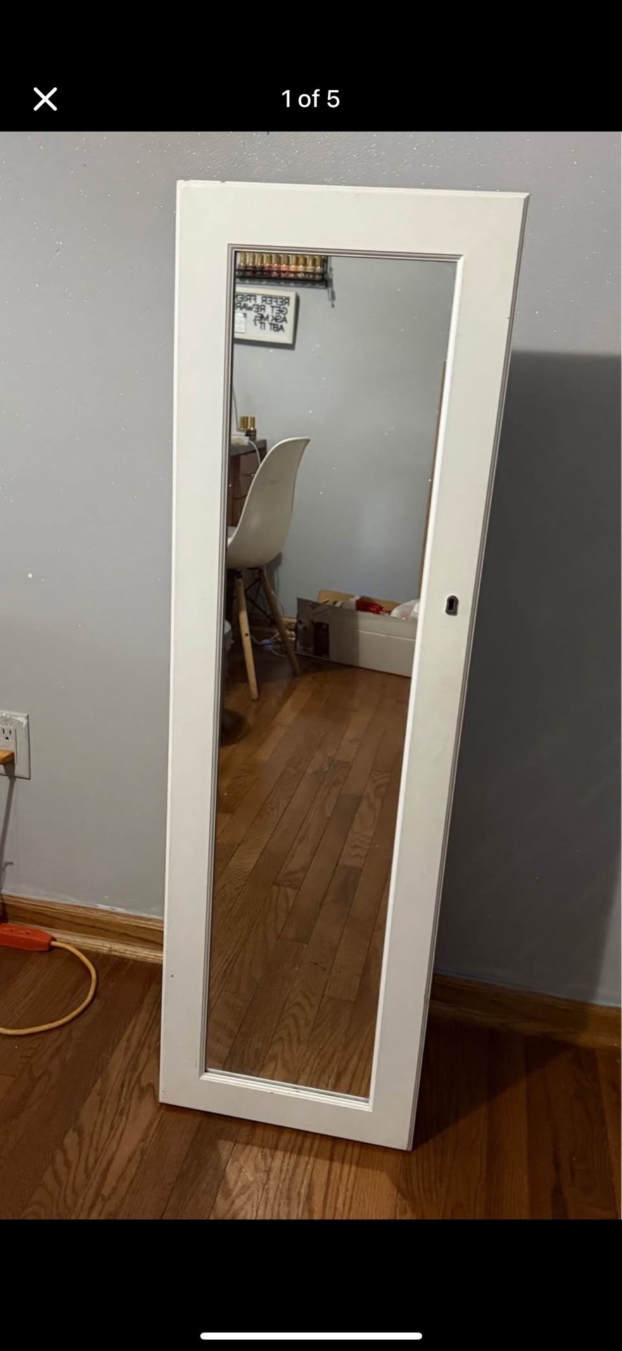 Mirror with jewelry storage