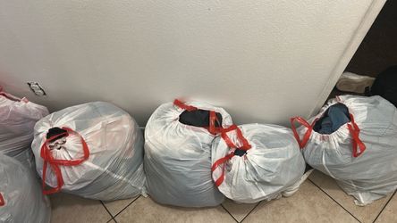 8 full clothing bags