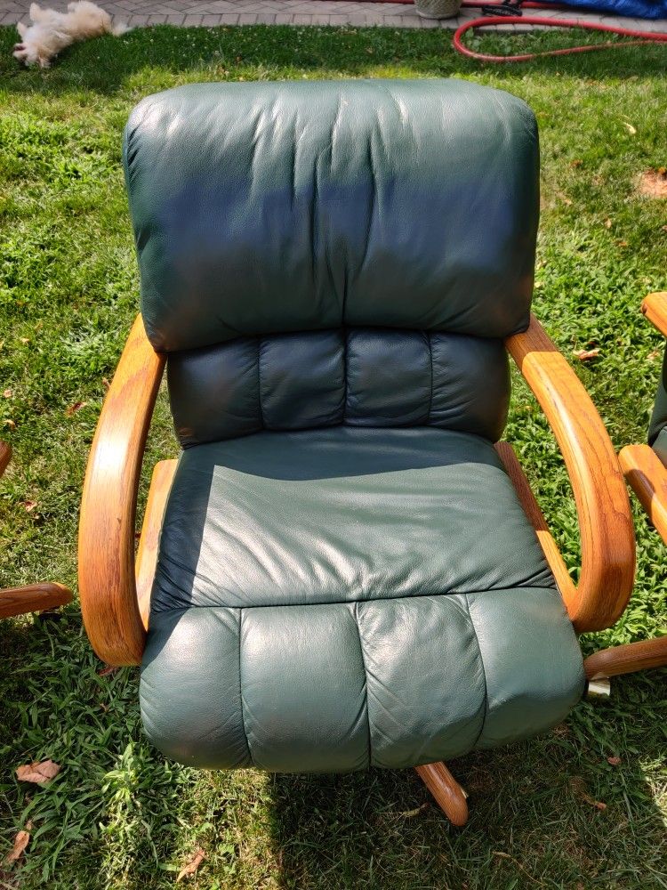 4 Leather Chairs On The Rolls