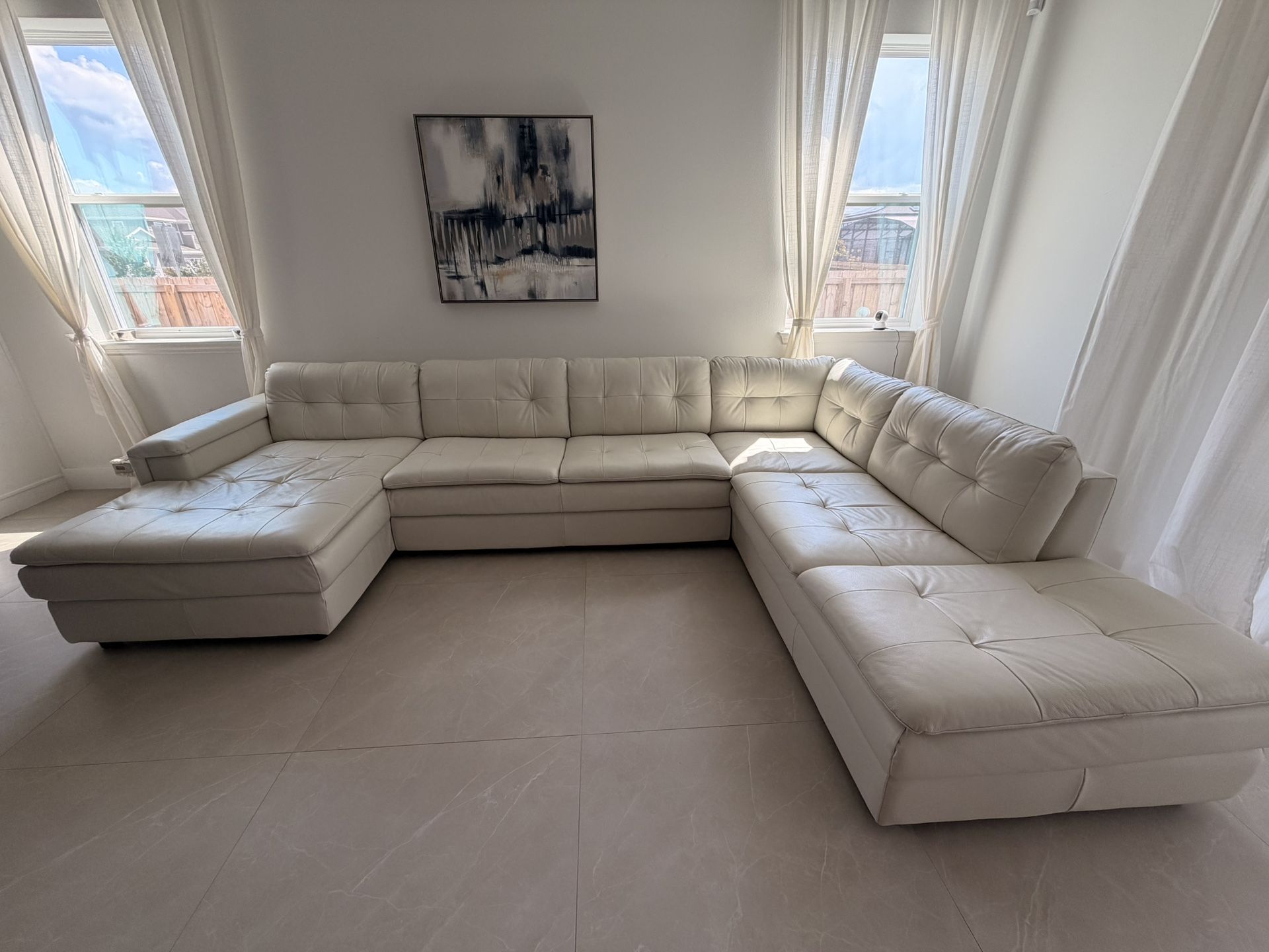 Chateau D’ax Sectional Leather Cream Couch