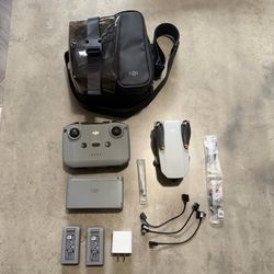DJI Mini 2 SE Ready to Fly Camera Drone Bundle w/ Remote, 2 Batteries, Bag, Charger, backup blades