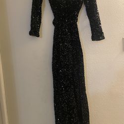 Black sequin open back partyGown