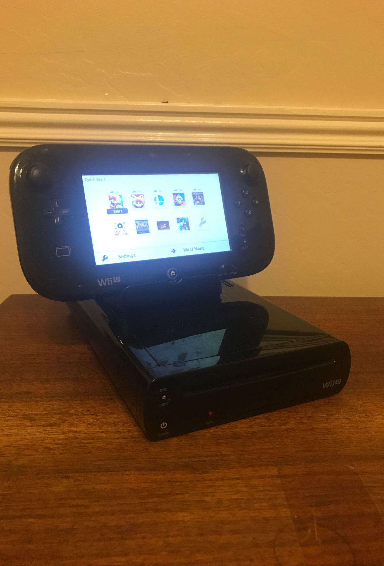 Nintendo Wii U with loaded games, gamepad, and charging dock