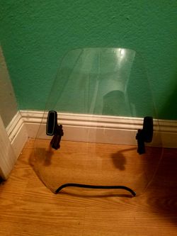 Universal Type Motorcycle Deflector Windsheild..fits most Sportster style motorcycles..No Brackets..But u can get them online..Good Condition!