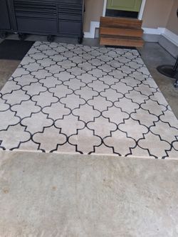 Beige wool area rug