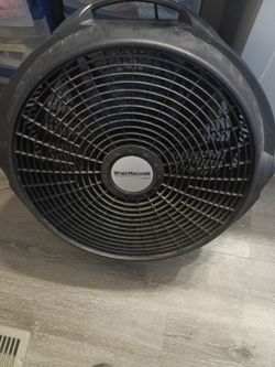 Wind machine tilting fan