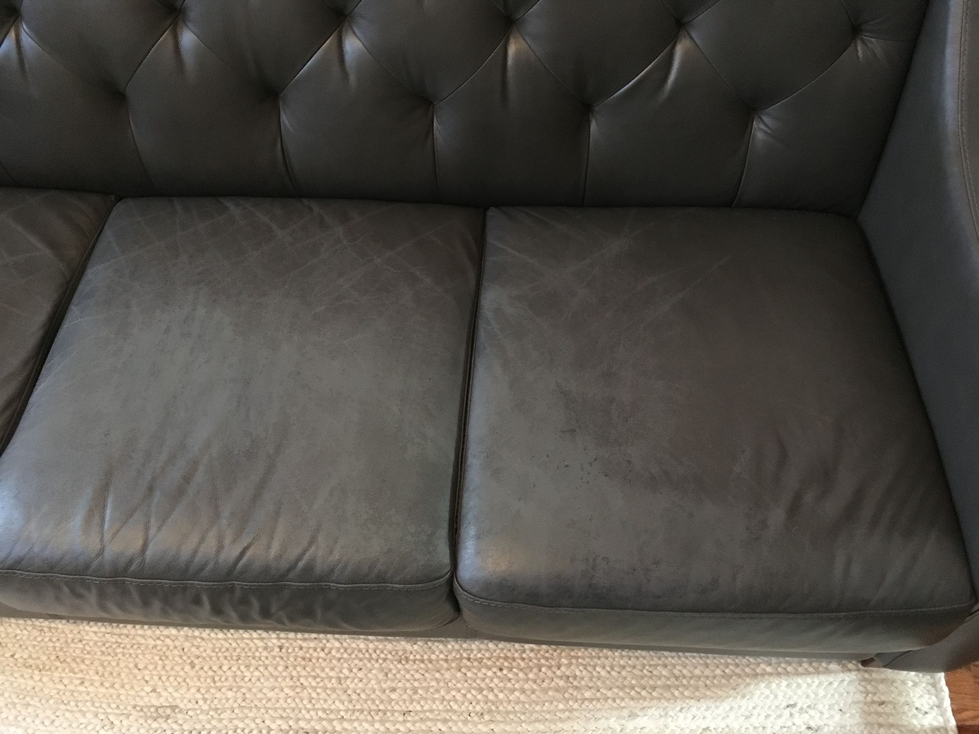 Claudia II slate grey leather sofa from Macy’s, 76” x 33”