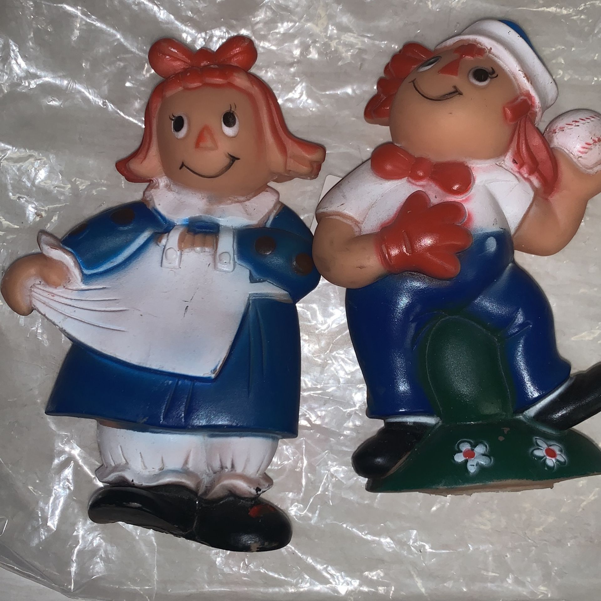 Raggedy Ann and Andy squeak toys