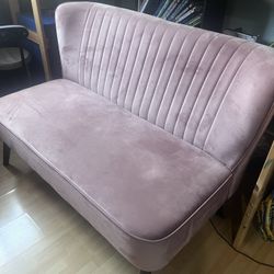 pink velvet sofa