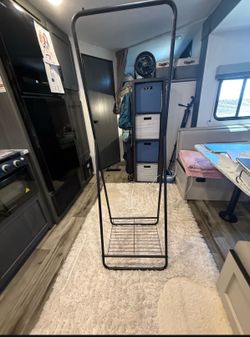 Small clothes hanging rack
