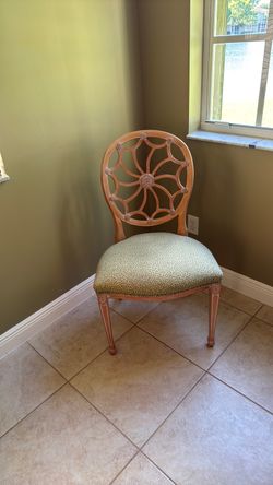 2 side chairs that are perfect when you need extra seats for company.