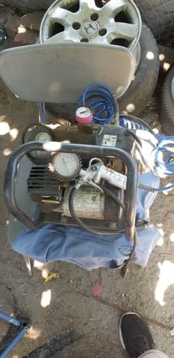 Compressor with tire fill trigger