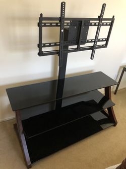 Nice 3 glass layers TV. Very nice and sturdy will fit almost any size of TV. $140 firm. Any questions please ask.