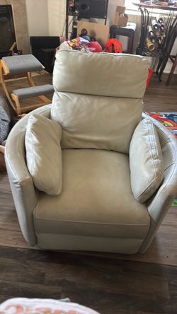 Revolving rocking chair