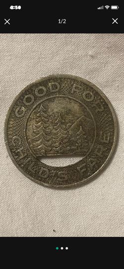 Seattle Transit System "Good For Child's Fare" rass Token -- 21mm w/ Pine Trees