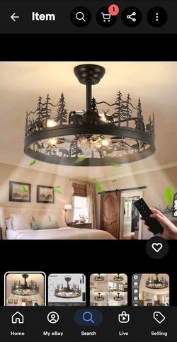 NEW! Rustic wildlife-themed farmhouse ceiling fan with light. It features a matte black metal cage or drum shade showcasing laser-cut forest animal si