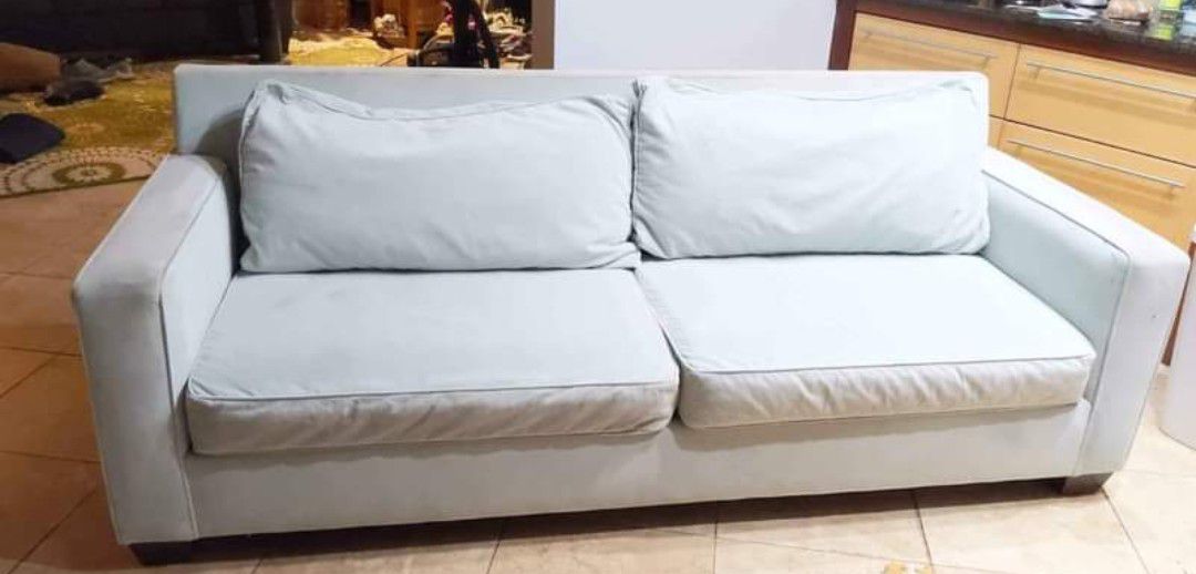 Light grey-blue velvet couch