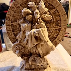 Decorative Aztec mythology-inspired statue