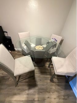 Round dining table with 5 chairs