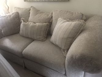 Couch and ottomans for sale.