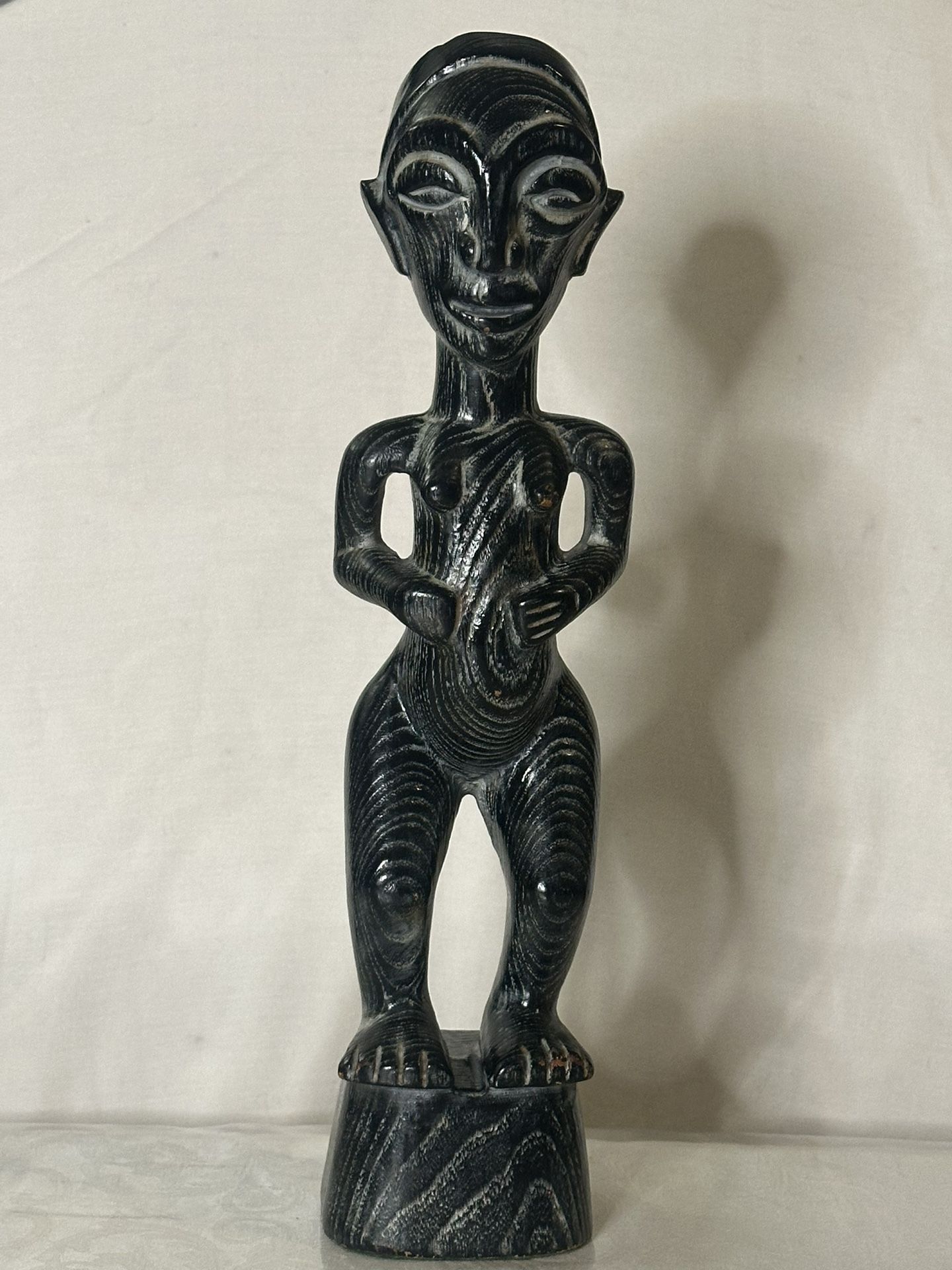 Luba female carved wood statue, often referred to as an African fertility statue. 13” Tall