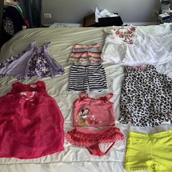 Toddler girl dresses/swim/shorts size 4T. White time and tru dress is size 4-6. Crazy 8 cheetah dress has light stains. Carters striped shorts are fad