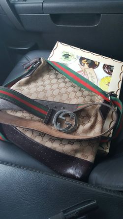 Authentic men's Gucci belt and carrier bag