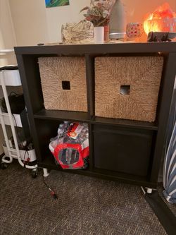 IKEA Kallax brwinish/ black cabinet with 2 wicker storage basket and 1 cloth storage basket