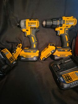 Brand new DeWalt drill and Impact 2-5amp batteries and 2-2amp batteries with 2 chargers