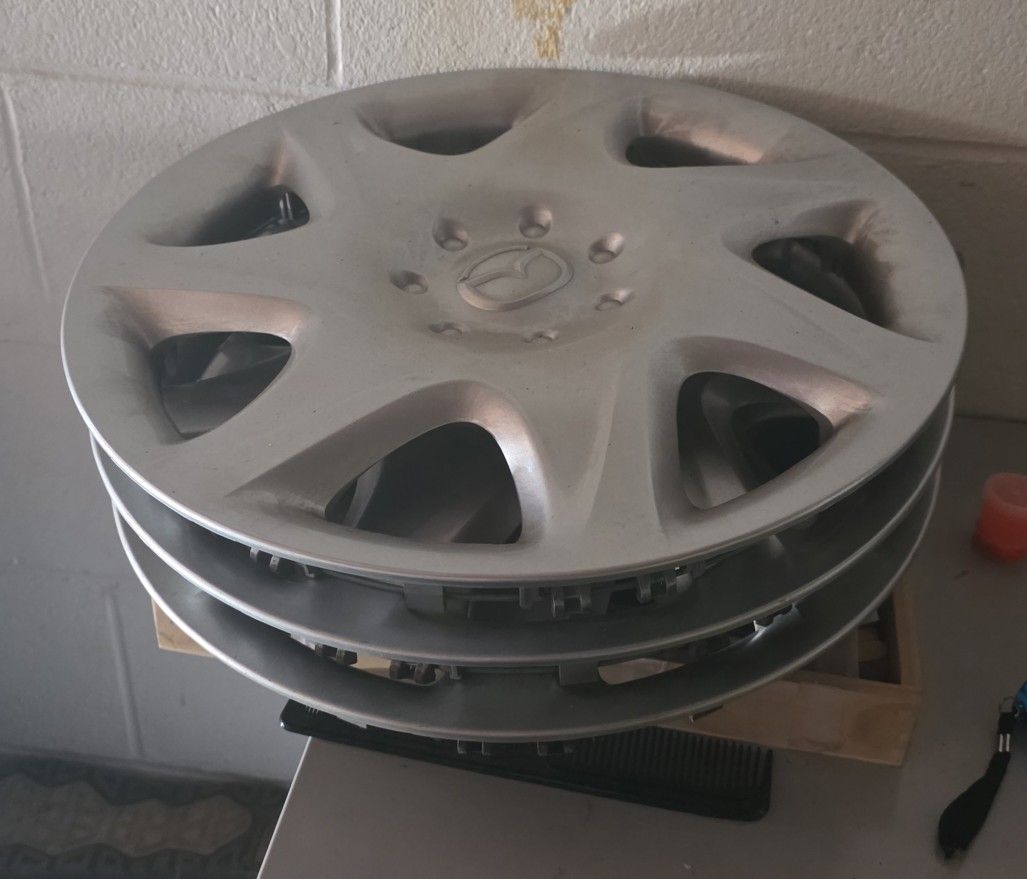 2000 Mazda protege hubcaps