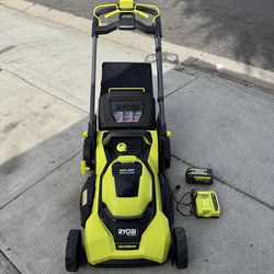 RYOBI 40V HP Brushless 21 in. Cordless Battery Walk Behind Self-Propelled Lawn Mower with (1) 6.0 Battery And Charger