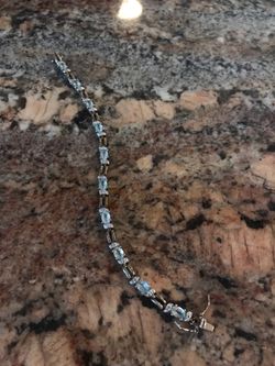 Woman’s sterling silver w gem stones and CZ