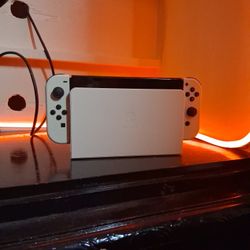 OLED Nintendo Switch (White) w/ 2 games