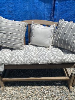 Teak rocking bench with cushions. Paid 500 for it SOLID TEAK