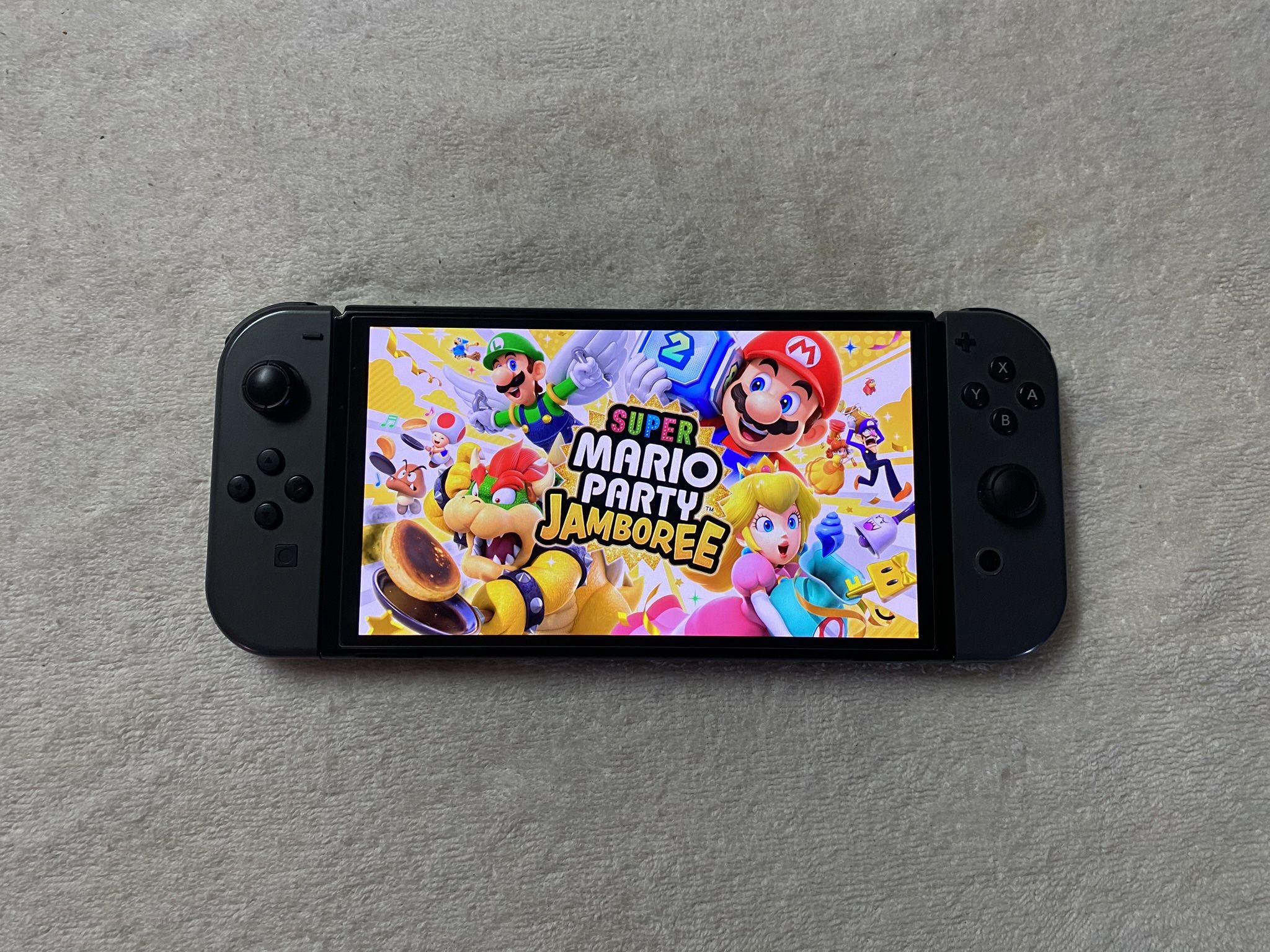 NINTENDO SWITCH OLED MODEL with 125 POPULAR SWITCH GAMES 