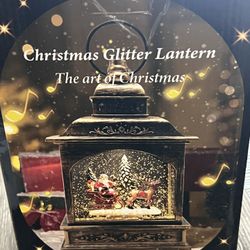 The San Francisco Music Box Company Santa on Sleigh with Reindeer Musical Water Globe Lantern