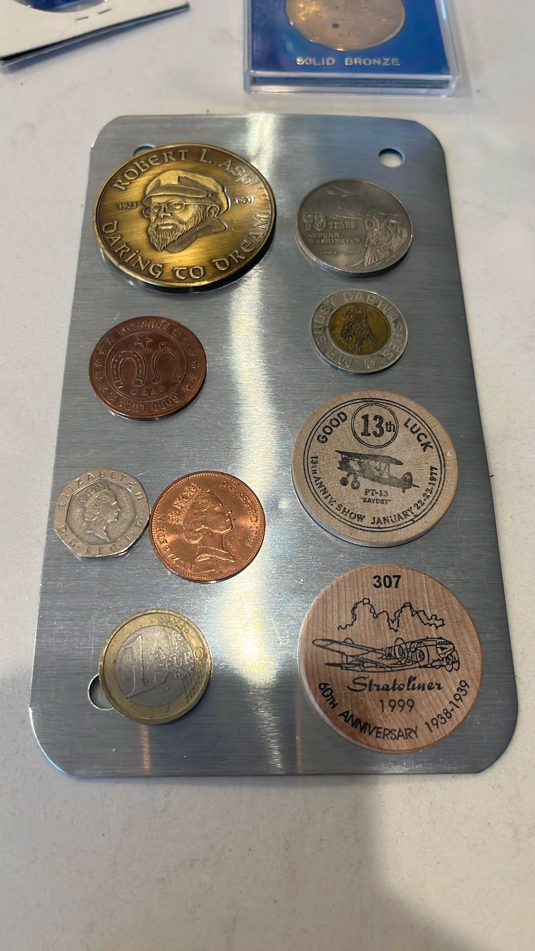 7 Coins , 2 Wooden Nickels